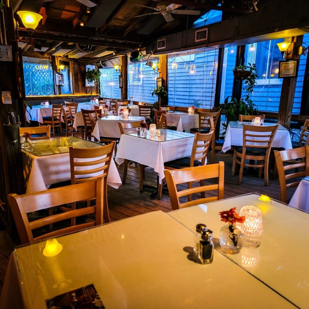 Cfe Degas, one of the many romantic restaurants in New Orleans that's perfect for a Valentine's Day date.