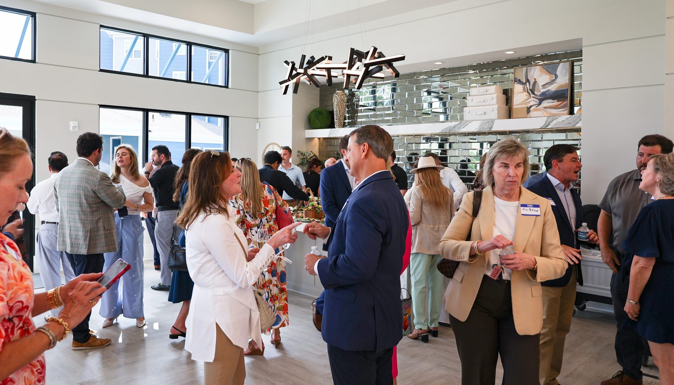 Guests mingling at Alluvia Grand Opening